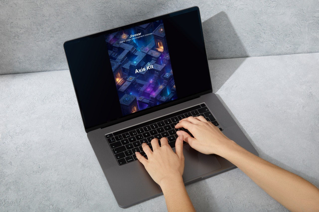 Person using a laptop on a gray surface with a colorful screen