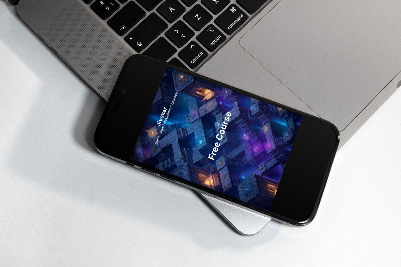 Smartphone with a free course app on screen next to a laptop